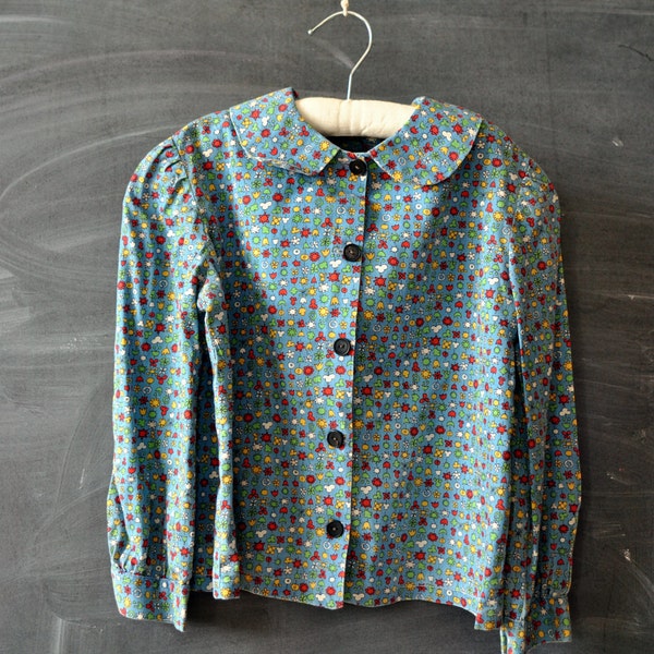 Vintage girls long sleeve shirt, blue with colorful sun and flower pattern, peter pan collar, 50s, 60s