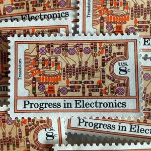 May include: A rectangular postage stamp featuring a beige circuit board design with orange, purple, and green electronic components. The text reads Progress in Electronics and U.S. 8c, with the word Transistors printed along the left side.