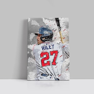 May include: A canvas print of a baseball player in a gray and white uniform with the name "Riley" and the number "27" in red. The player is wearing a black helmet and holding a baseball bat. The background is a gray and white abstract design.
