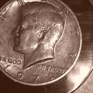 May include: A set of three ceramic nesting bowls in shades of blue, green, and white. The bowls feature a speckled glaze and a simple, modern design. The largest bowl measures approximately 6 inches in diameter.