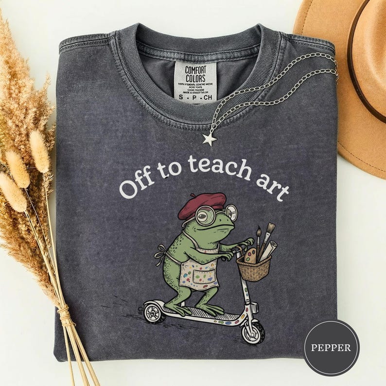 Off to Teach Art Shirt, Funny Frog Art Teacher Tee, Frog on Scooter Paint Gift, Women Art Educator Shirt, Frog Lover Tee, Funny Art Teacher Pepper