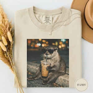 Funny Otter Drinking Iced Coffee Shirt, Animal Meme Graphic Tee, Otter Lover Gift, Funny Otter Shirt, Coffee Lover Tee, Otter Tee Ivory