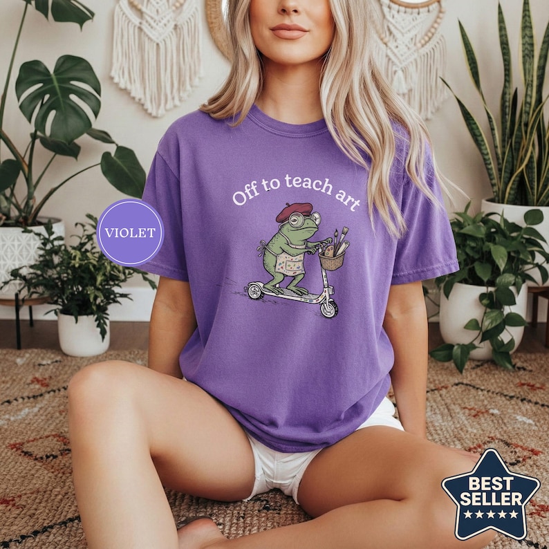 Off to Teach Art Shirt, Funny Frog Art Teacher Tee, Frog on Scooter Paint Gift, Women Art Educator Shirt, Frog Lover Tee, Funny Art Teacher Violet