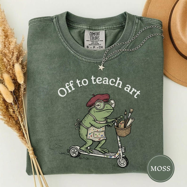Off to Teach Art Shirt, Funny Frog Art Teacher Tee, Frog on Scooter Paint Gift, Women Art Educator Shirt, Frog Lover Tee, Funny Art Teacher Moss