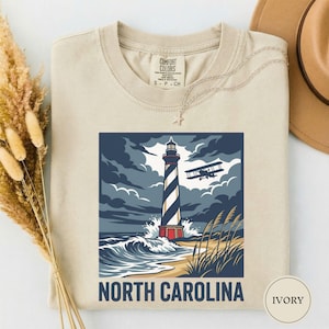 North Carolina Lighthouse Biplane Shirt, North Carolina Pride Tee, North Carolina Gift, Outer Banks Shirt, Coast Tee, NC Nature Gift Ivory
