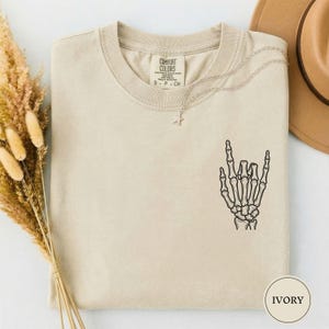 Rock On Skeleton Hand Shirt, Funny Rock Graphic Tee, Rock Fingers Shirt, Cool Mens Graphic Tee, Rock Music Gift, Rocker Tee, Gift for Him Ivory