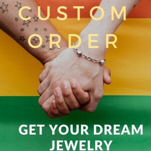 May include: Two hands clasped together, one wearing a silver bracelet with round beads. The background features a rainbow flag. Text overlay reads "CUSTOM ORDER" and "GET YOUR DREAM JEWELRY".