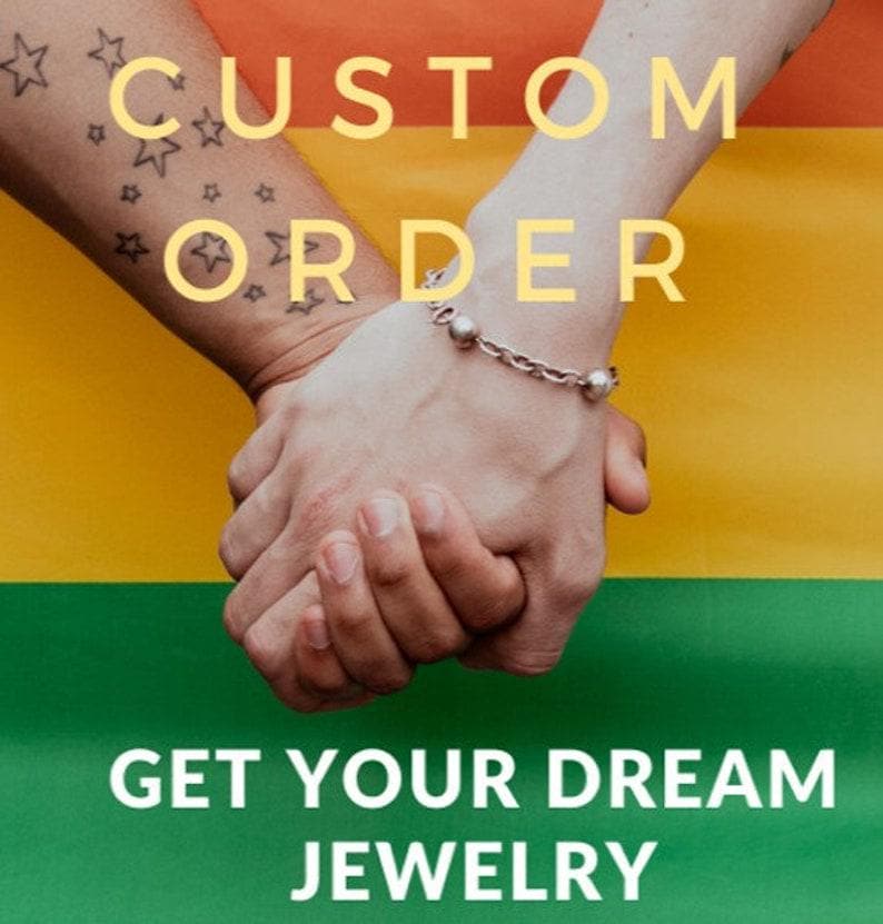 May include: Two hands clasped together, one wearing a silver bracelet with round beads. The background features a rainbow flag. Text overlay reads "CUSTOM ORDER" and "GET YOUR DREAM JEWELRY".