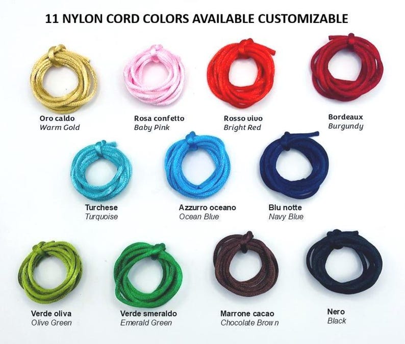 May include: Eleven coiled nylon cords in various colors including warm gold, baby pink, bright red, burgundy, turquoise, ocean blue, navy blue, olive green, emerald green, chocolate brown, and black, labeled with their respective color names.