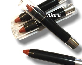 BITTEN, Deep  Red  lipstick, Cream Formula,Twist Up Tube, pigmented, Vitamin E  Enriched,  Rich Color - Natural Ingredients, Crush Cosmetics