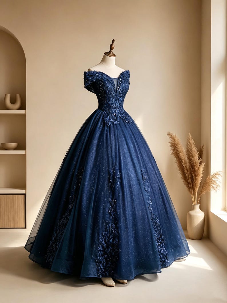 Back profile of a one size adjustable lace up corset tie back closure on a luxury navy blue starry tulle ball gown.