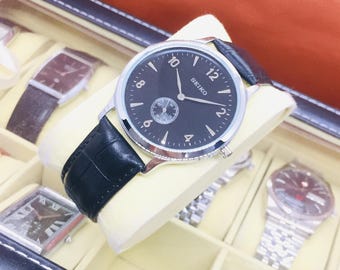 Vintage Seiko Tank Side Second Quartz: Black Dial, Black Leather Belt, Wrist Watch