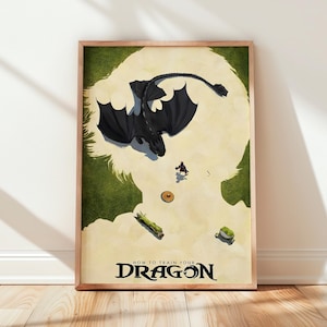 May include: A rectangular framed poster featuring a black dragon with large wings flying over a light-colored landscape with green patches. A small figure stands below the dragon. The text HOW TO TRAIN YOUR DRAGON is printed at the bottom.