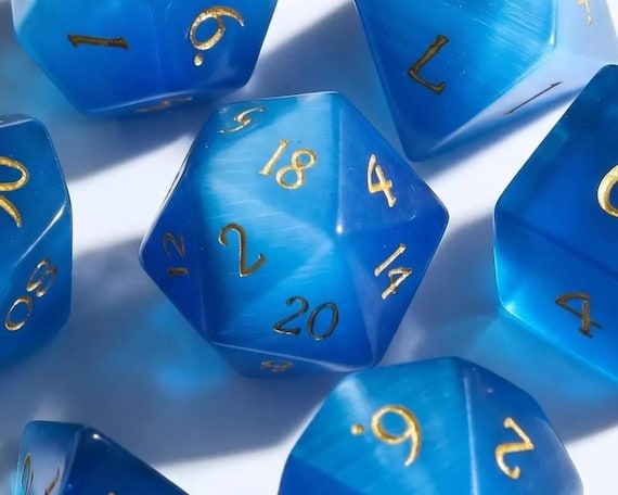 Azure Aetherstone gemstone dice, deep blue with cat-eye shimmer