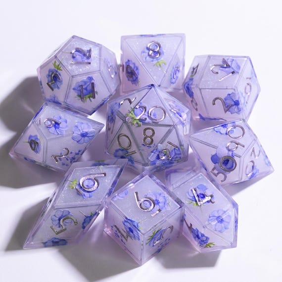Enchanted Bloom dice set, lilac resin with pressed blue flowers