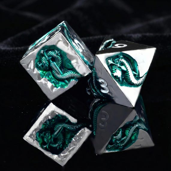 Emerald Dagger dice set, metal with serpent and dagger relief