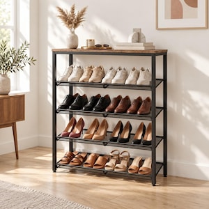 May include: A five-tier shoe rack with a black metal frame and a wood-grain top shelf. The rack holds various footwear, including white sneakers, black and brown dress shoes, high-heeled pumps, and open-toe sandals arranged on mesh shelves.