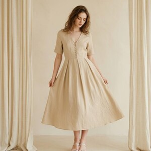 flutter sleeve linen button front midi dress Rene Flutter-Sleeve Linen Button-Front Midi Dress by Anthropologie in Blue, Size: XXS