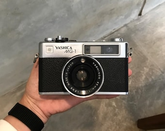 Yashica MG-1 35mm-45mm f/2.8 Kompakte analoge Kamera