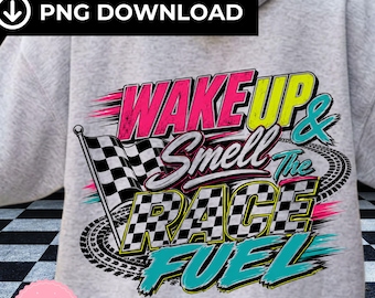 May include: A light gray hoodie featuring the text "WAKE UP & Smell The RACE FUEL" in vibrant pink, teal, and white. A checkered flag and tire track graphic are also included in the design. The hoodie is a PNG download.