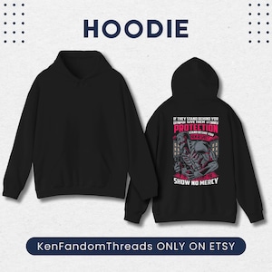 May include: Black hoodie with a front view and a back view. The back of the hoodie features a graphic with the text "IF THEY STAND BEHIND YOU GIVE THEM PROTECTION STAND BESIDE YOU THEM RESPECT SHOW NO MERCY". The text "HOODIE" is at the top.