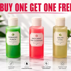 May include: Three home fragrance oil bottles with white caps and labels. The bottles are filled with green, pink, and yellow liquids. The labels read "Hawaiian Punch", "Baccarat Pink Champagne", and "Lolita (Type)". The text "BUY ONE GET ONE FREE" is at the top.