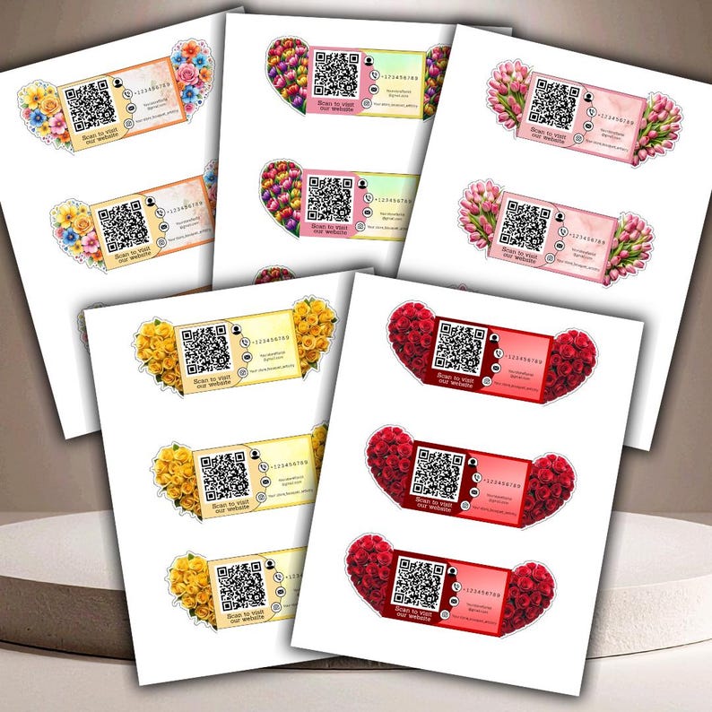 May include: A collection of business cards with floral and heart-shaped designs. Each card features a QR code, contact information, and the text "Scan to visit our website." The cards are in various colors, including pink, yellow, and red.