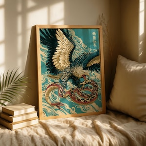 May include: A framed wall art print featuring a detailed illustration of a large eagle with dark blue and cream feathers clutching a patterned snake. The background consists of stylised light blue waves and Japanese text in the upper right corner.