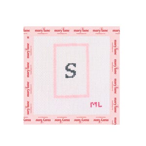 May include: A square needlepoint canvas featuring a white grid pattern with a black letter S centered inside a light pink rectangular border. The border of the canvas is printed with the repeating red text Mary Lane Needlepoint.