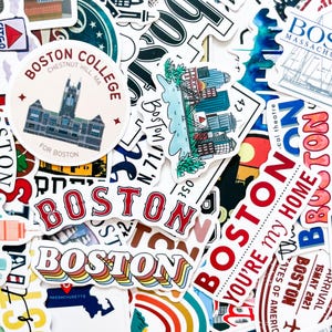 May include: A selection of vibrant stickers with the word "Boston" in diverse styles. The stickers showcase Boston landmarks, the Boston College logo, and phrases such as "You're my home".