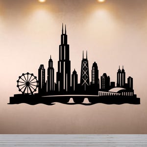 May include: A black wall decal featuring the Chicago skyline silhouette, including the Willis Tower, the John Hancock Center, and the Navy Pier Ferris wheel, set against a plain background with a solid base line.