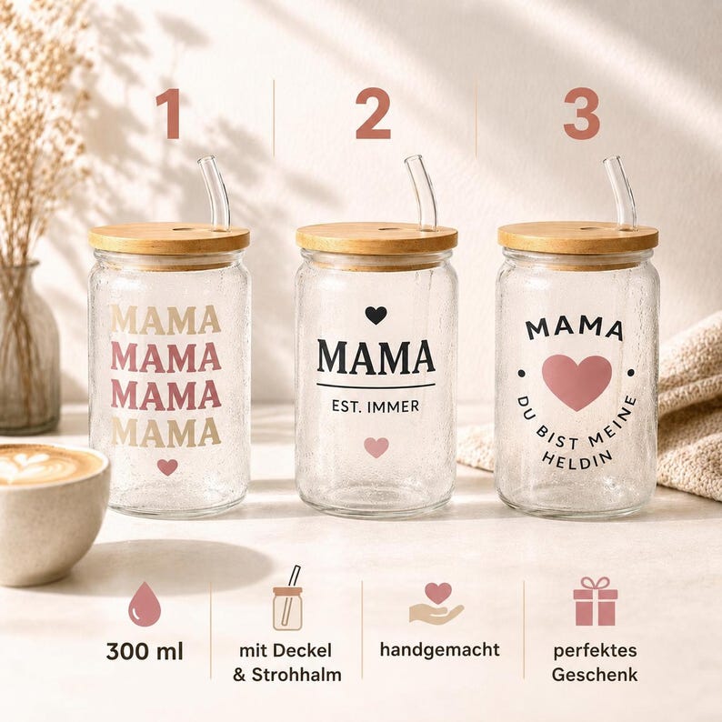 May include: Three clear glass tumblers with bamboo lids and glass straws. Glass 1 features the word MAMA in stacked text. Glass 2 says MAMA EST. IMMER. Glass 3 says MAMA DU BIST MEINE HELDIN with a heart. Each glass has a 300 ml capacity.