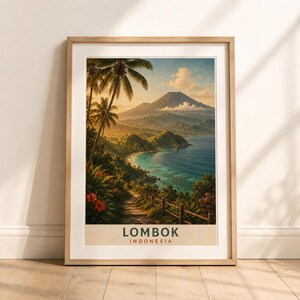 May include: A framed wall art print featuring a scenic landscape of Lombok, Indonesia. The image displays a tropical coastline with palm trees, a mountain in the distance, and a path leading toward the ocean. The text LOMBOK INDONESIA is printed.