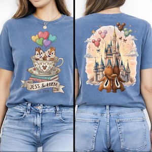 May include: Blue t-shirt featuring Chip and Dale in a teacup with balloons, books, and the text "Jess & Liam EST. 2026" on the front. The back shows a castle, Chip and Dale hugging, and Mickey Mouse balloons.