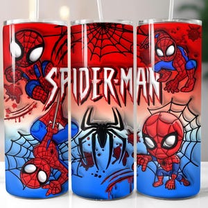 May include: Three stainless steel tumblers with a Spider-Man theme. The design features Spider-Man illustrations, spiderwebs, and the text "SPIDER-MAN" against a red, blue, and white backdrop. Each tumbler has a straw.