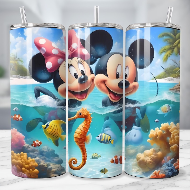 May include: A stainless steel tumbler featuring Mickey and Minnie Mouse in a tropical ocean scene. The design includes colorful coral, fish, and a seahorse. The background shows a blue sky, palm trees, and a sandy beach.