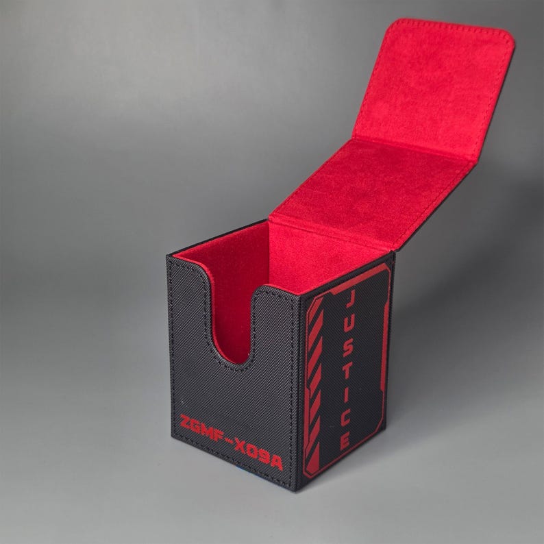 Open black and red deck box showing soft red interior lining and magnetic lid, trading card storage box for double sleeved decks