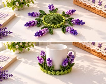May include: A round, green crocheted coaster featuring a central circular base surrounded by six radiating sprigs of purple and lavender flowers with green leaves. The coaster is shown flat and also wrapped around a white ceramic mug.