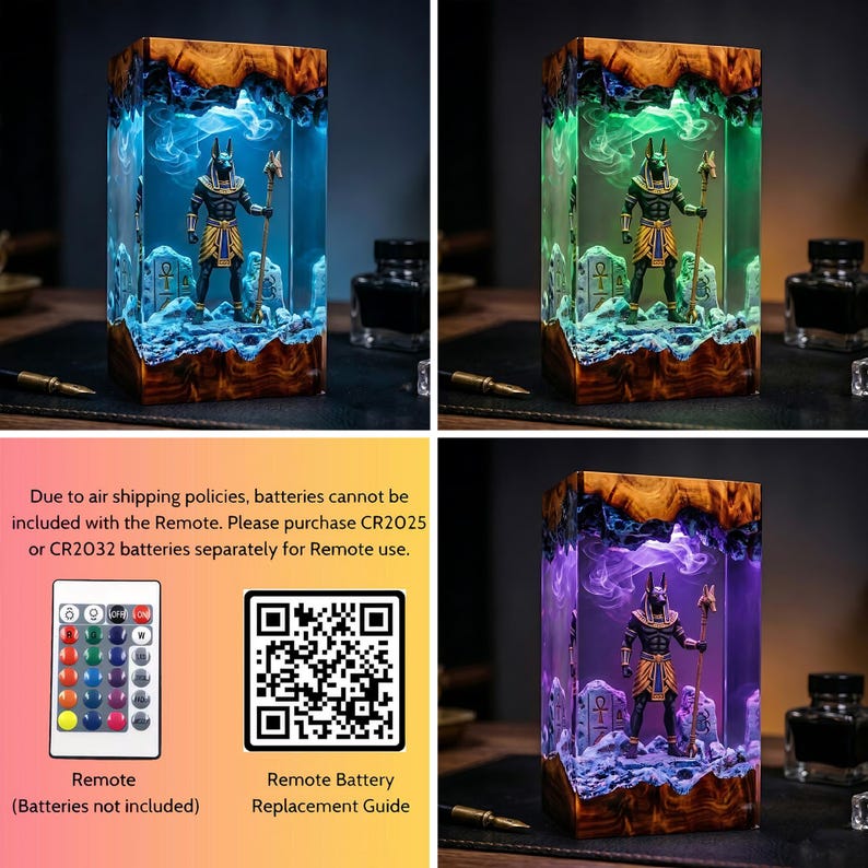 May include: A rectangular resin lamp featuring a miniature Anubis figure holding a staff, surrounded by stone-like structures. The lamp emits blue, green, or purple light, creating a smoky effect within the clear resin and wood base.