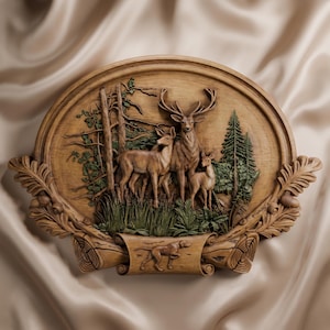 May include: An oval wooden wall plaque featuring a detailed relief carving of a stag, a doe, and a fawn standing in a forest. The frame is decorated with carved oak leaves and acorns, with a small carved dog on a scroll at the bottom centre.