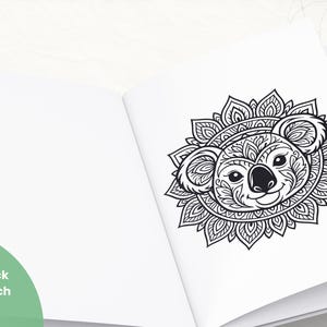 May include: A black and white illustration of a koala's face with a mandala design on an open book. The koala has detailed patterns within its features and is surrounded by a circular design. The text "Ein Blick ins Buch" is visible.