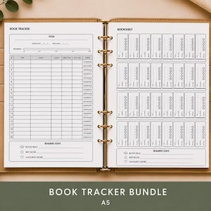 May include: A tan leather-bound A5 book tracker bundle with a gold spiral binding. The open pages display a book tracker and bookshelf layout, with space for goal setting and reading stats. A green pen rests on the right side.