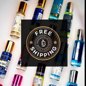 May include: An assortment of small perfume bottles with gold, silver, and black caps. The bottles are filled with various colored liquids, including blue, green, and pink. A circular logo with the words "FREE SHIPPING" is in the center.