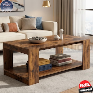 May include: A rectangular coffee table with a dark brown wood grain finish, featuring a lower storage shelf. The table surface holds a white bowl filled with grey stones and two white decorative vases. A stack of books sits on the lower shelf.