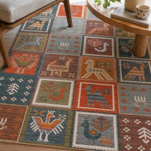 May include: A rectangular area rug featuring a grid of square panels, each containing distinct animal and geometric motifs in shades of orange, blue, green, and brown. The pattern includes stylized birds, four-legged creatures, and plants.