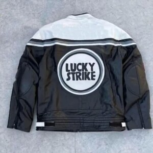 May include: Black and white leather jacket with a white upper back panel and the text "LUCKY STRIKE" in a circular design on the back. The jacket has black sleeves and a white stripe detail across the back.