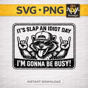 May include: Black and white graphic of a raccoon wearing sunglasses and a backwards baseball cap, with its tongue sticking out. The text reads "IT'S SLAP AN IDIOT DAY" above and "I'M GONNA BE BUSY!" below. The image is labeled "SVG • PNG" and "INSTANT DOWNLOAD".