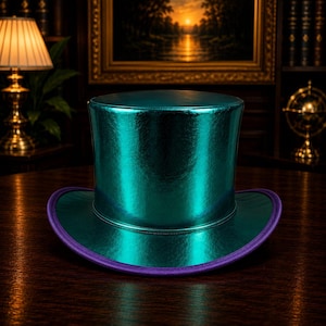 May include: A teal top hat with a shiny, metallic finish. The brim is teal with a purple trim. The hat is on a dark wooden surface.