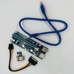 May include: A blue PCIe riser card with a blue USB cable, a small PCIe adapter board, and a black and yellow SATA power cable. The main circuit board features the text ptsaying, CE, and FC, along with several capacitors and a PCIe slot.