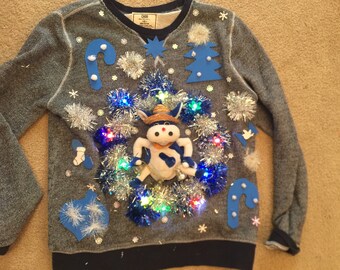 Ugly Chrstmas Sweater, formas de llevarlos de 10 | Revsta KENA Méxco